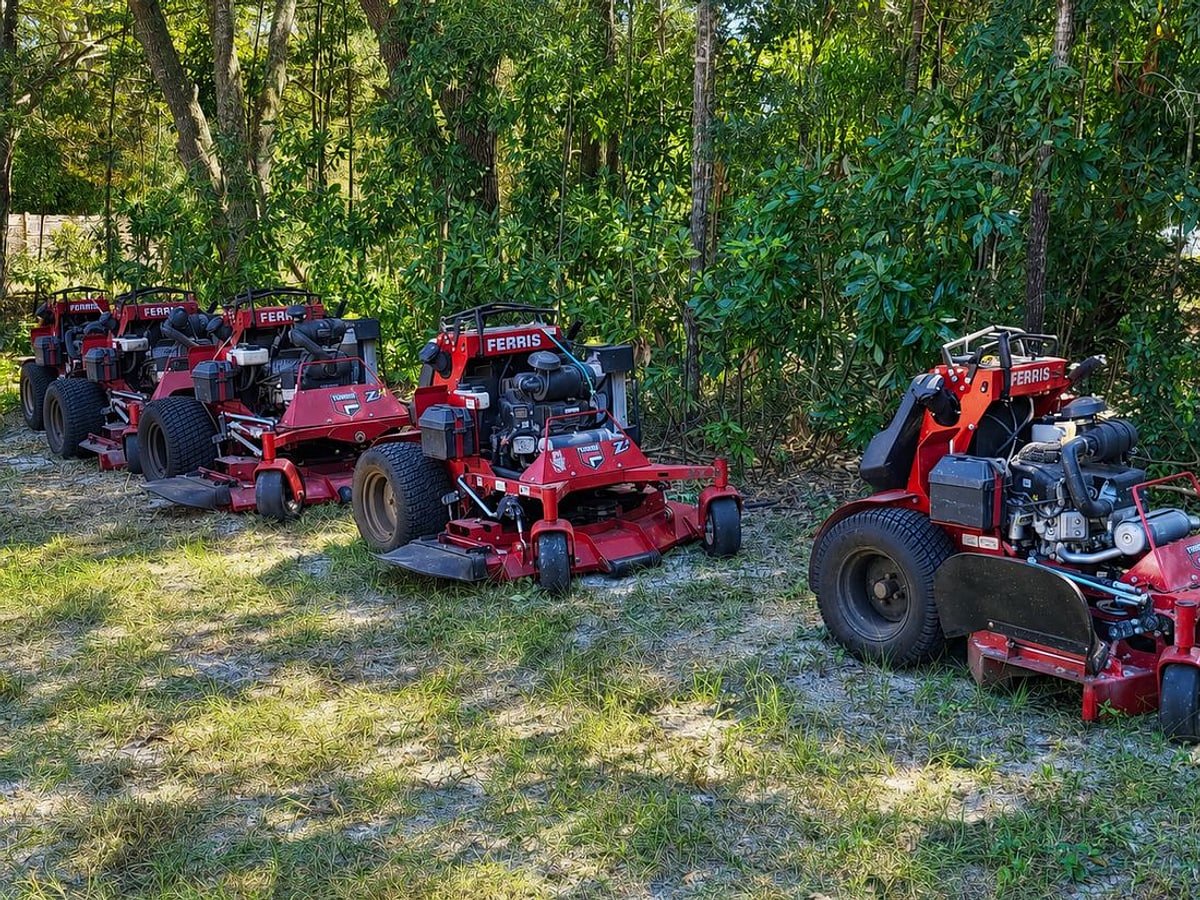 Premier Lawn Care's fleet of Ferris mowers staged for the day